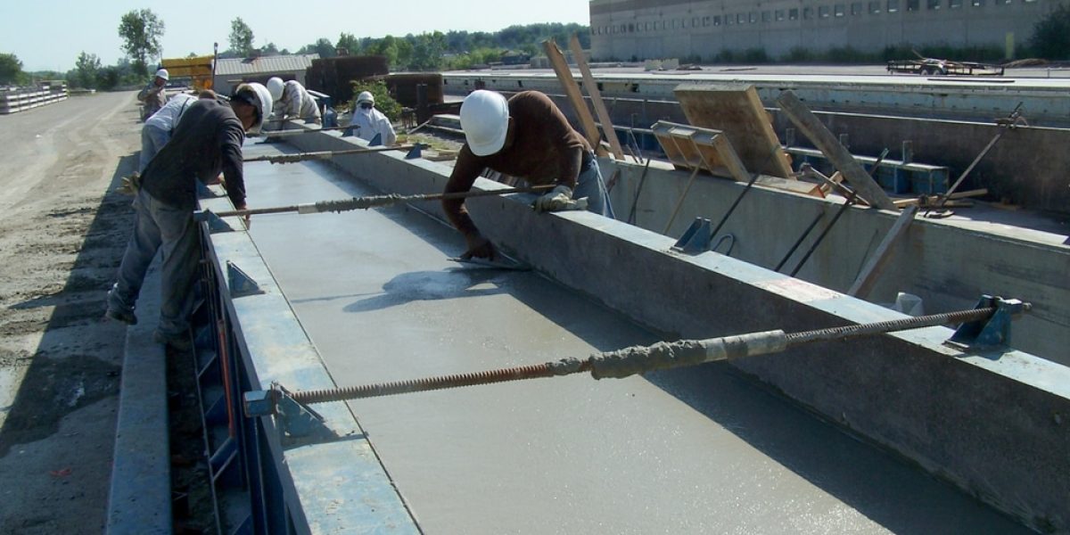 Workers finishing a surface in ongoing project in Portland, OR